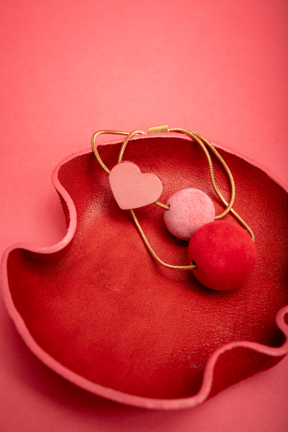 Leather, brass & resin earrings AMOUR CACHÉ model