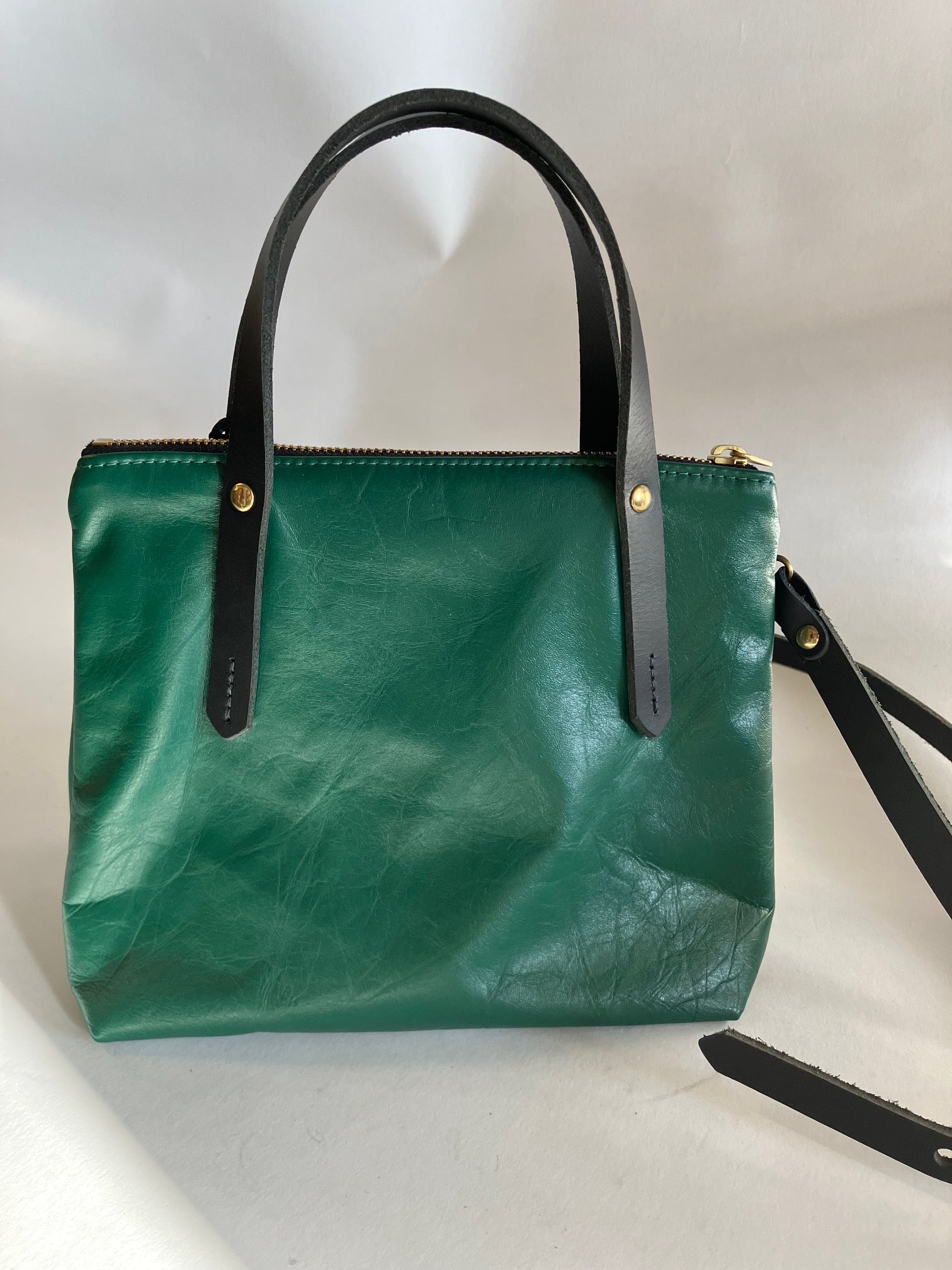 Leather handbag with crossbody strap PAPINEAU model