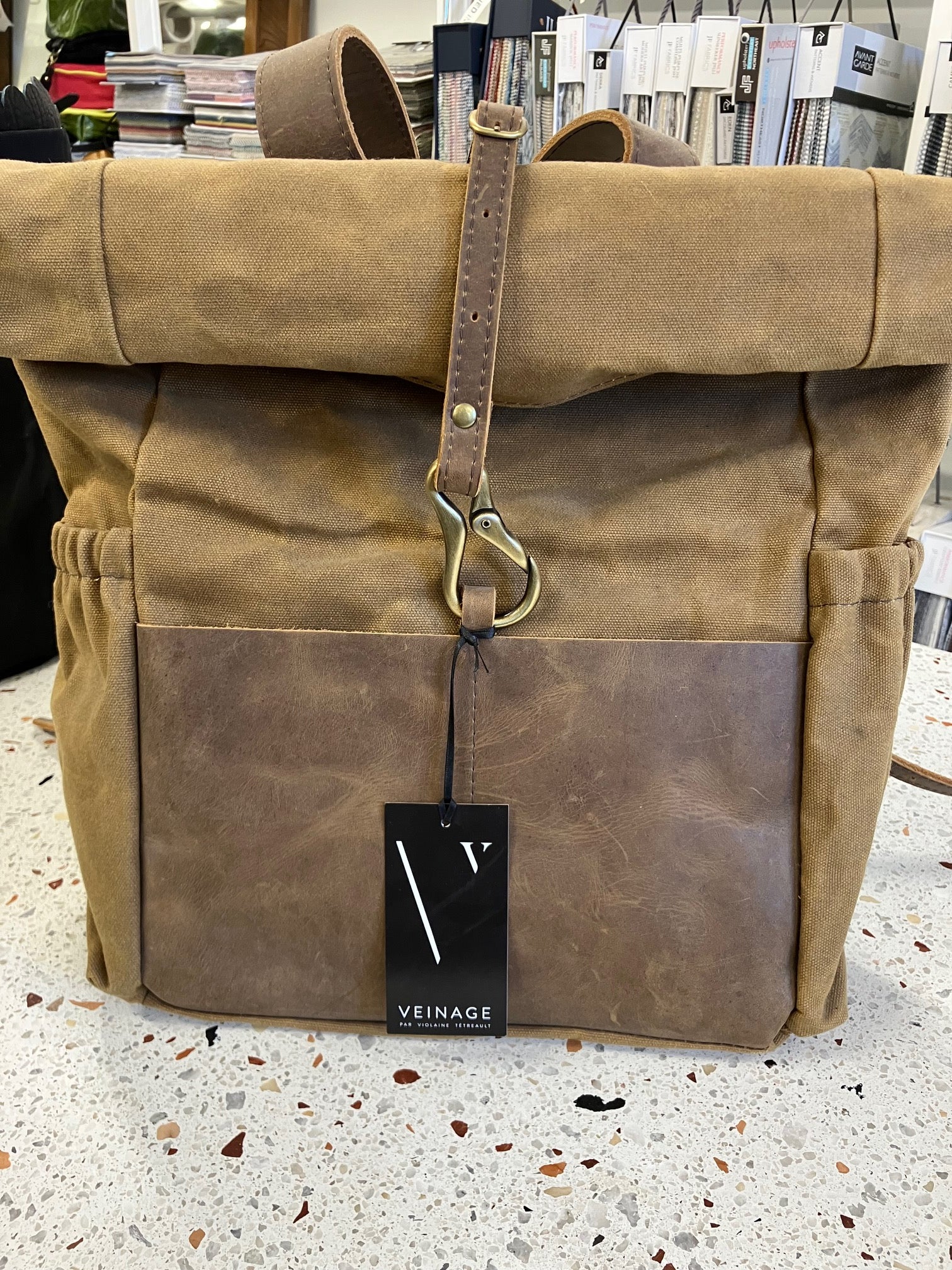 Roll top leather and waxed coton backpack DE LORIMIER model