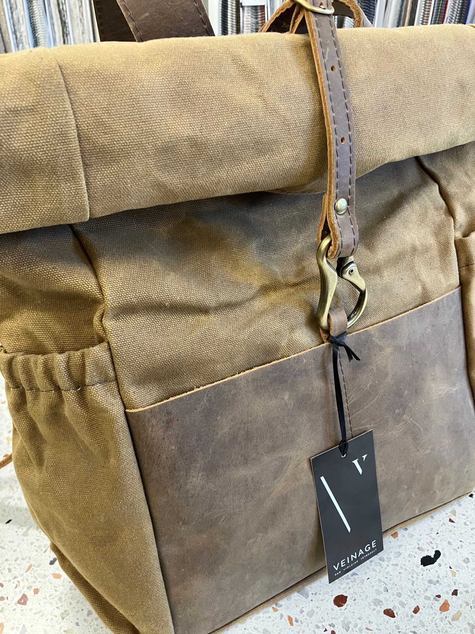 Roll top leather and waxed coton backpack DE LORIMIER model