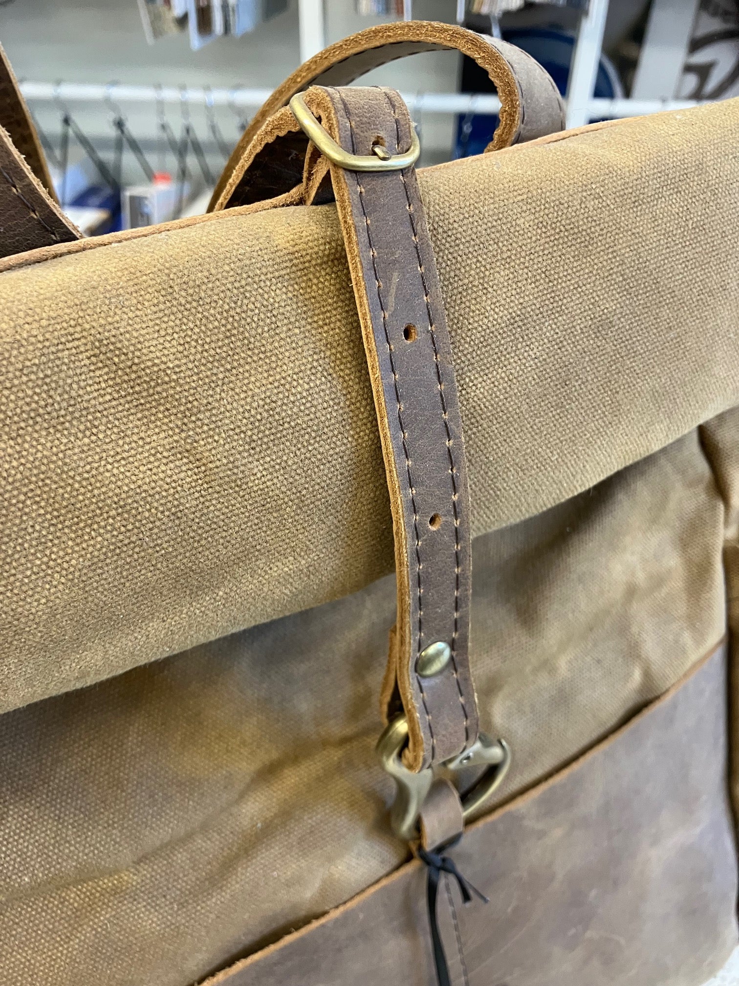 Roll top leather and waxed coton backpack DE LORIMIER model