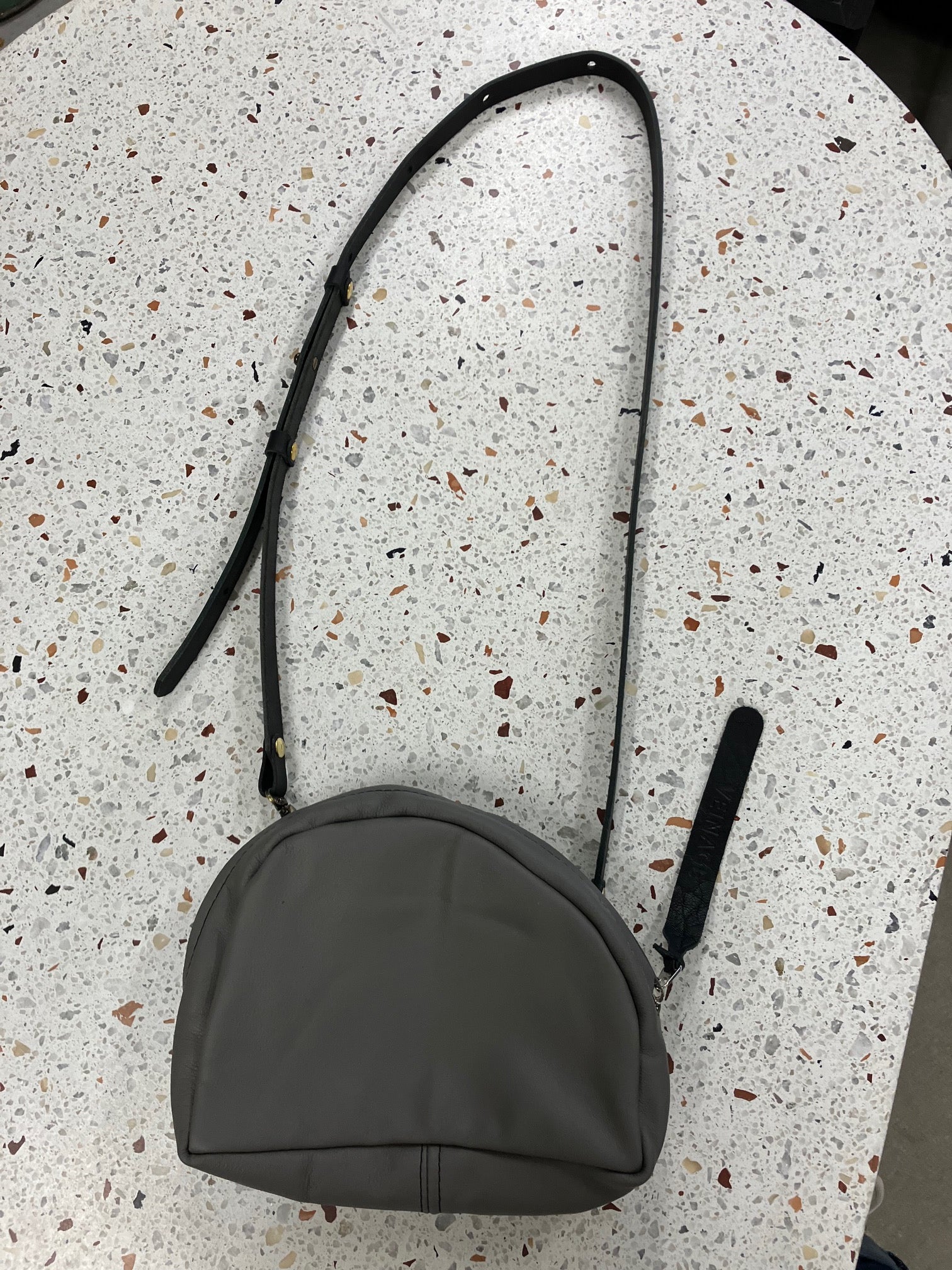 SAMPLE Leather shoulder bag with charm MERINGUE model