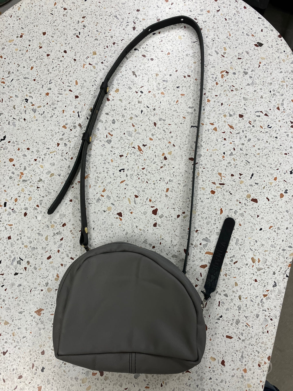 SAMPLE Leather shoulder bag with charm MERINGUE model