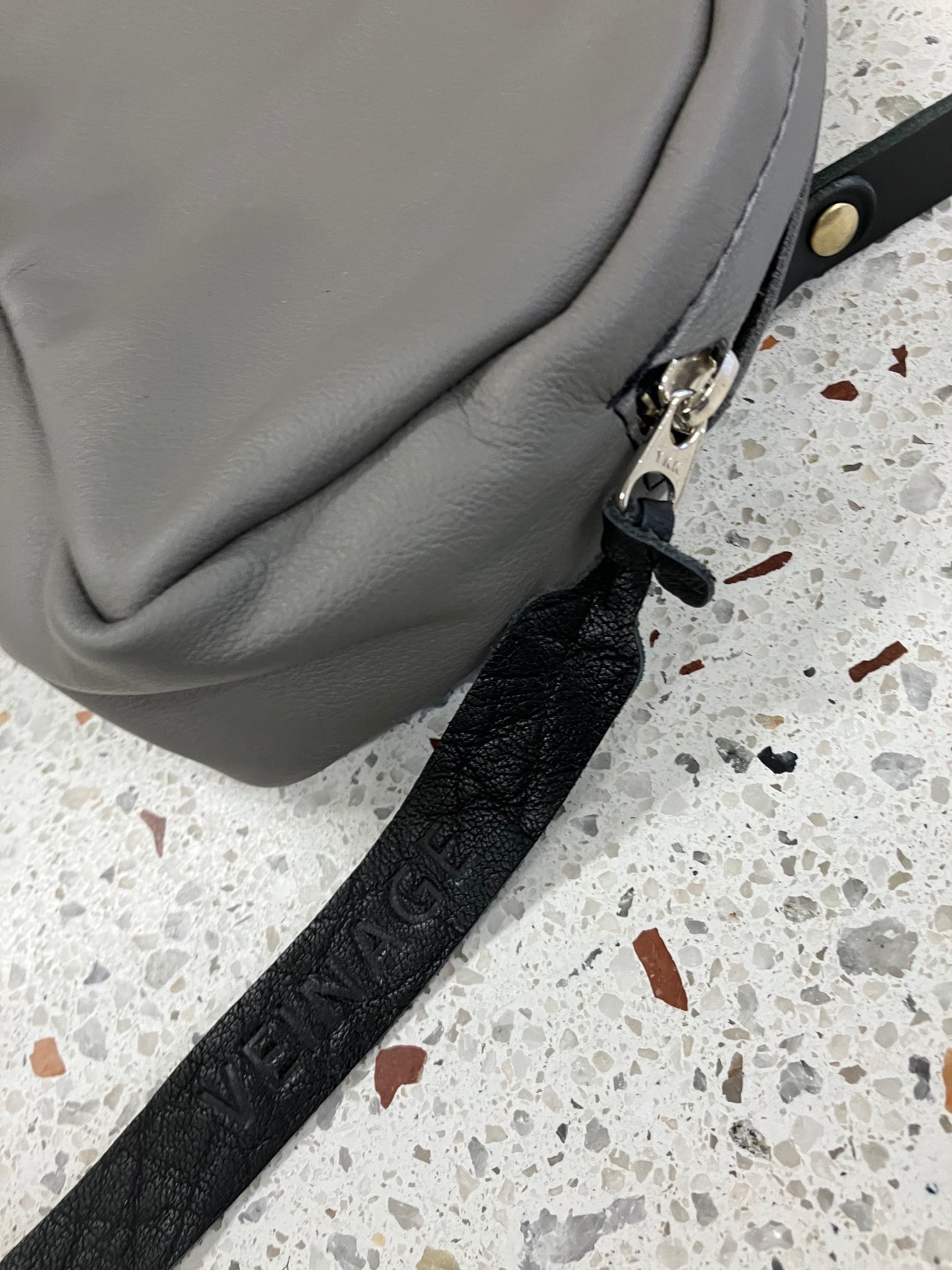 SAMPLE Leather shoulder bag with charm MERINGUE model