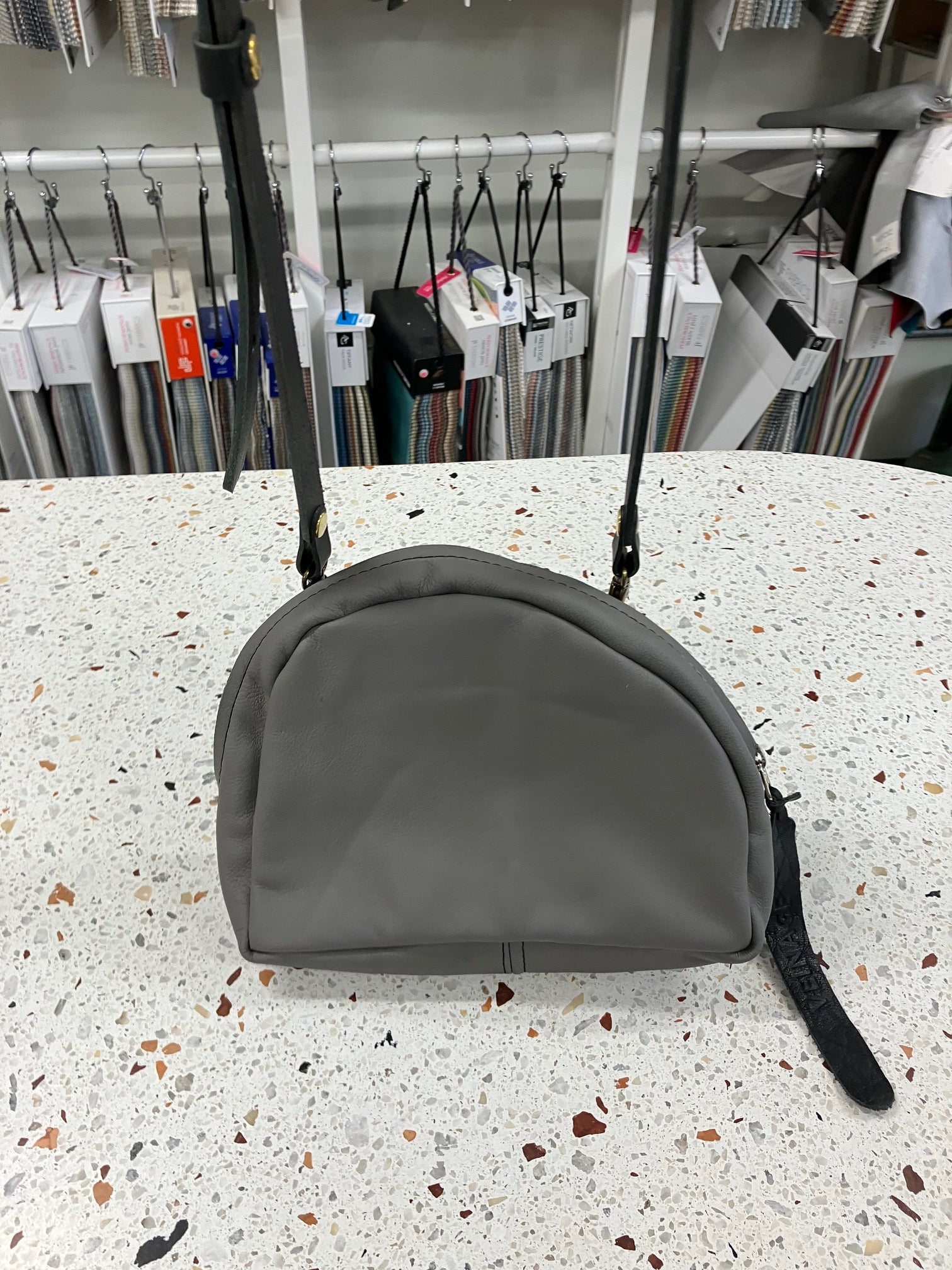 SAMPLE Leather shoulder bag with charm MERINGUE model