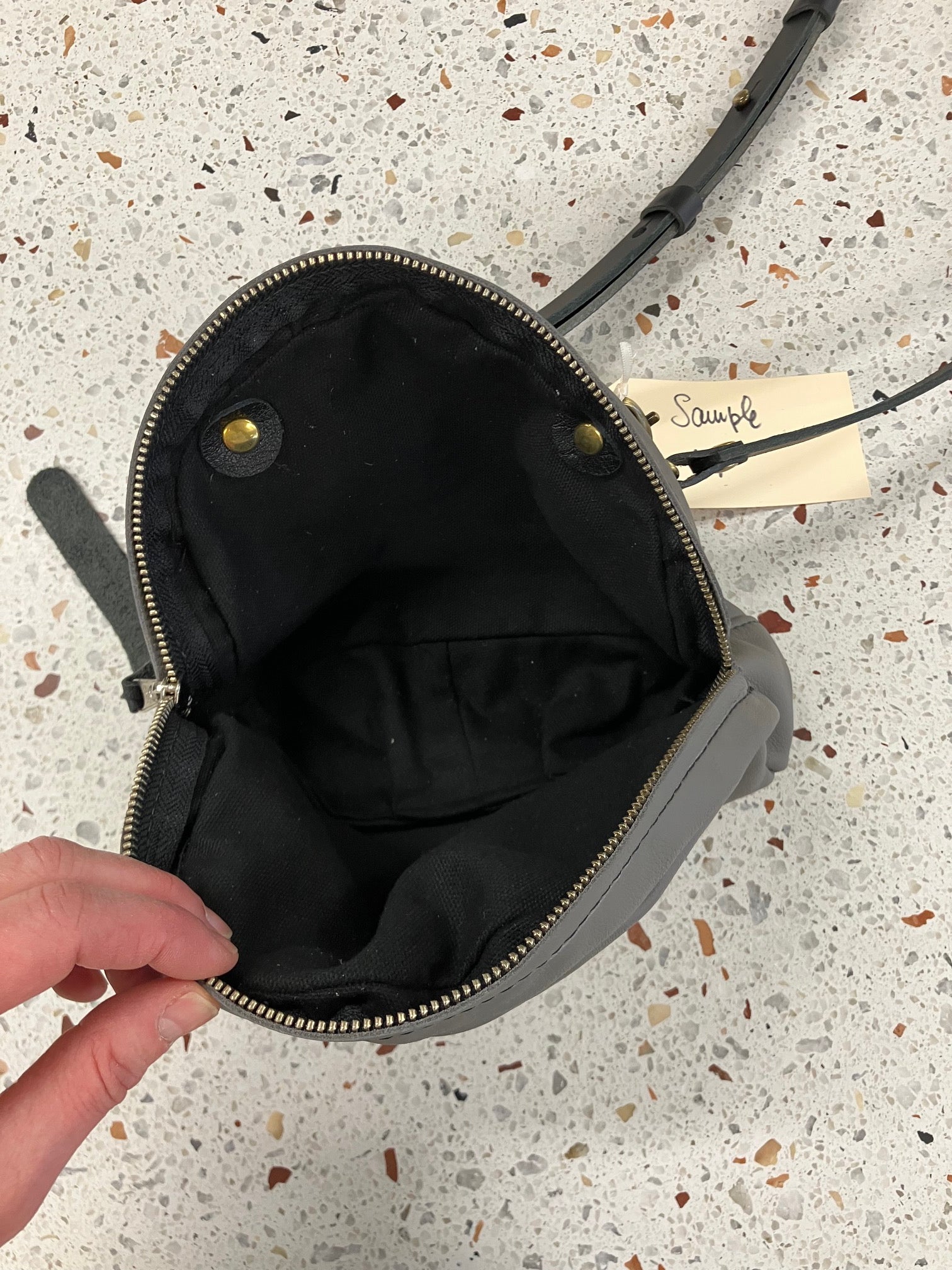 SAMPLE Leather shoulder bag with charm MERINGUE model