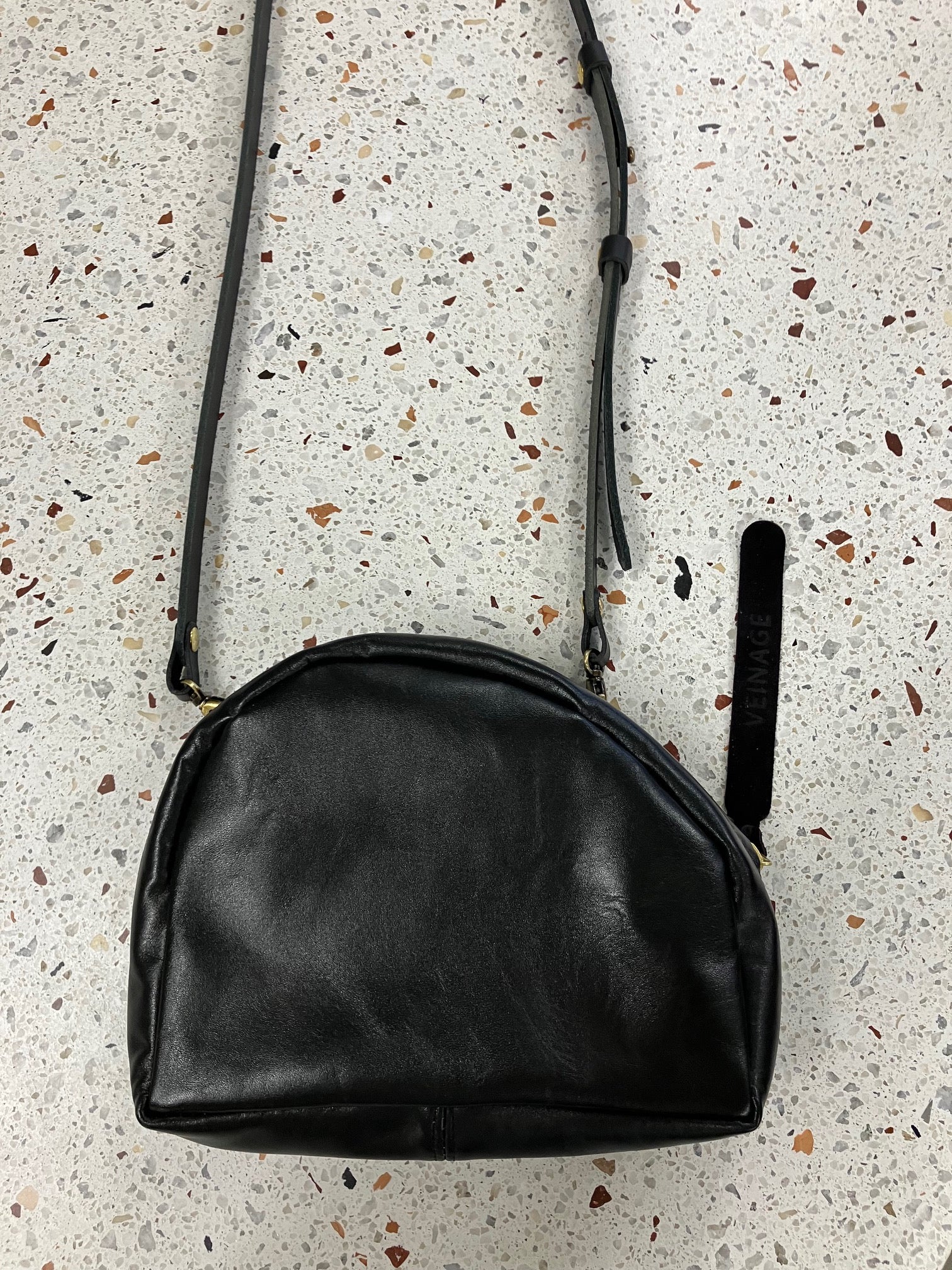 SAMPLE Leather shoulder bag with charm MERINGUE model