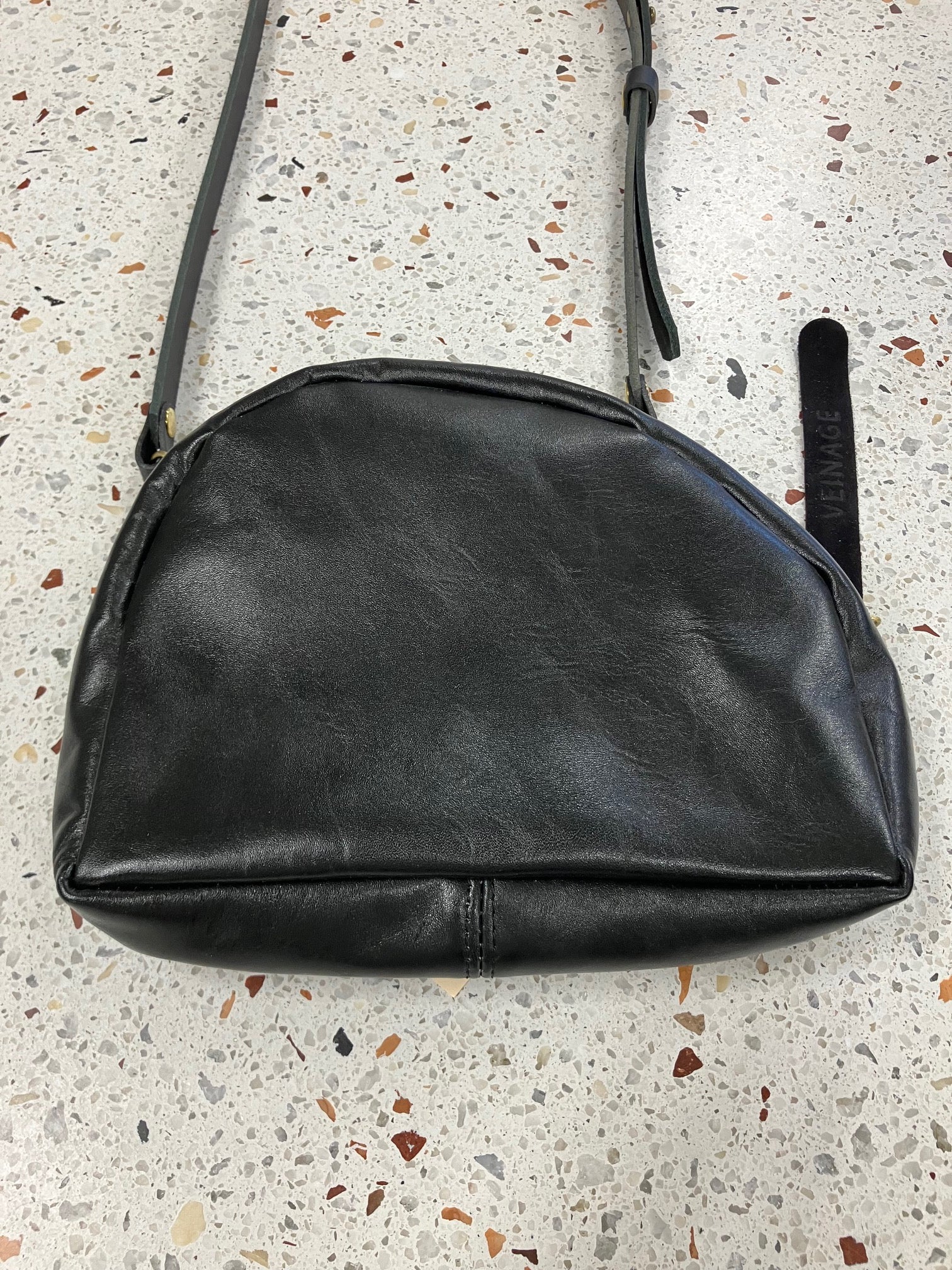 SAMPLE Leather shoulder bag with charm MERINGUE model