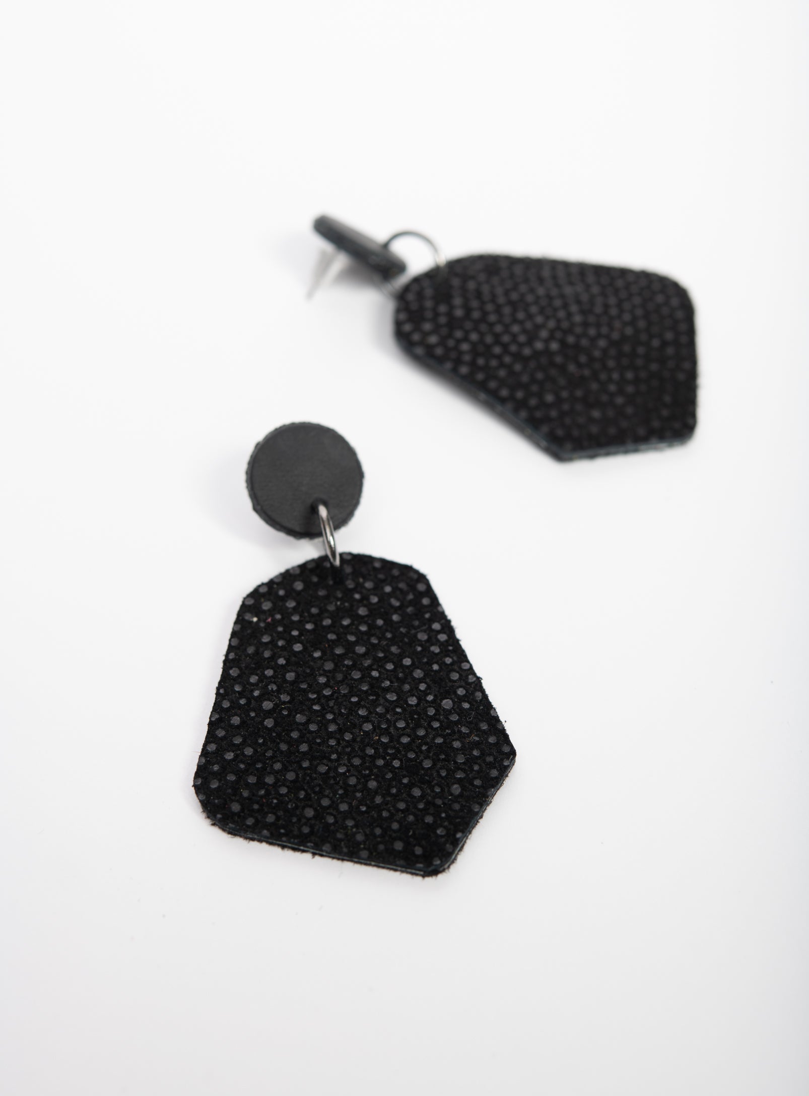 Large geometrical leather earrings DÉLIMA model, Veinage handmade in Montreal, Canada