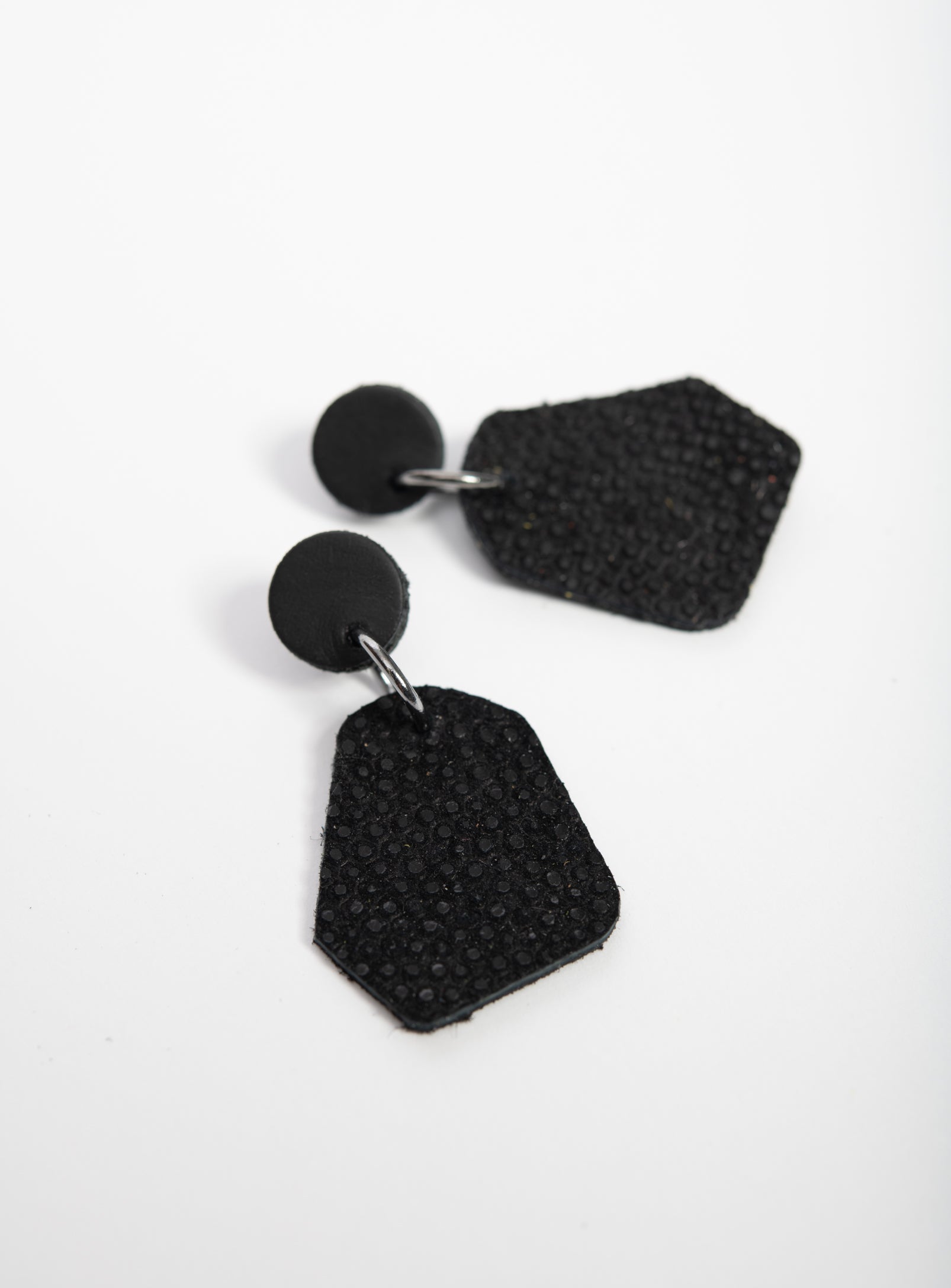Large geometrical leather earrings DÉLIMA model, Veinage handmade in Montreal, Canada