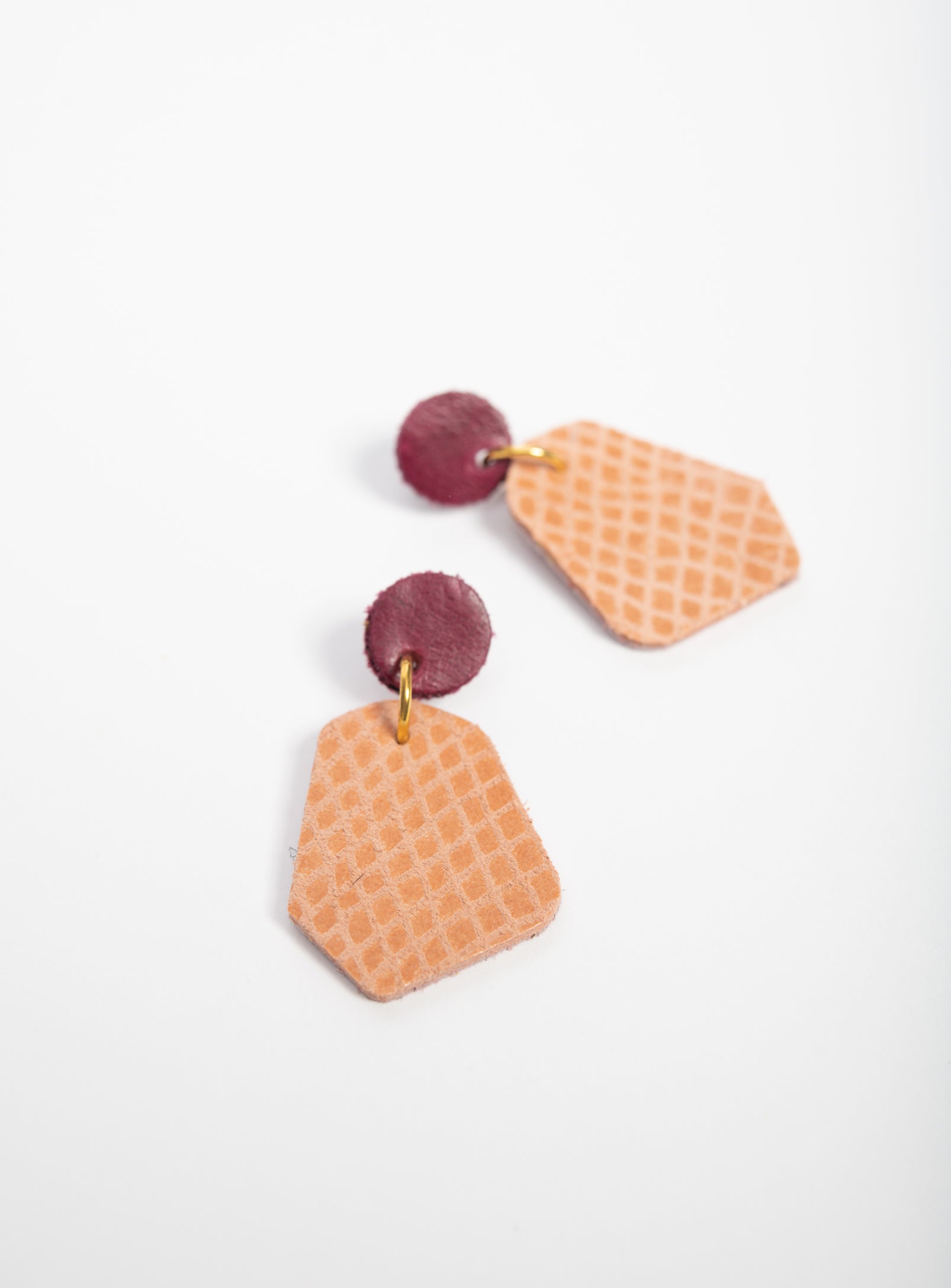 Large geometrical leather earrings DÉLIMA model, Veinage handmade in Montreal, Canada