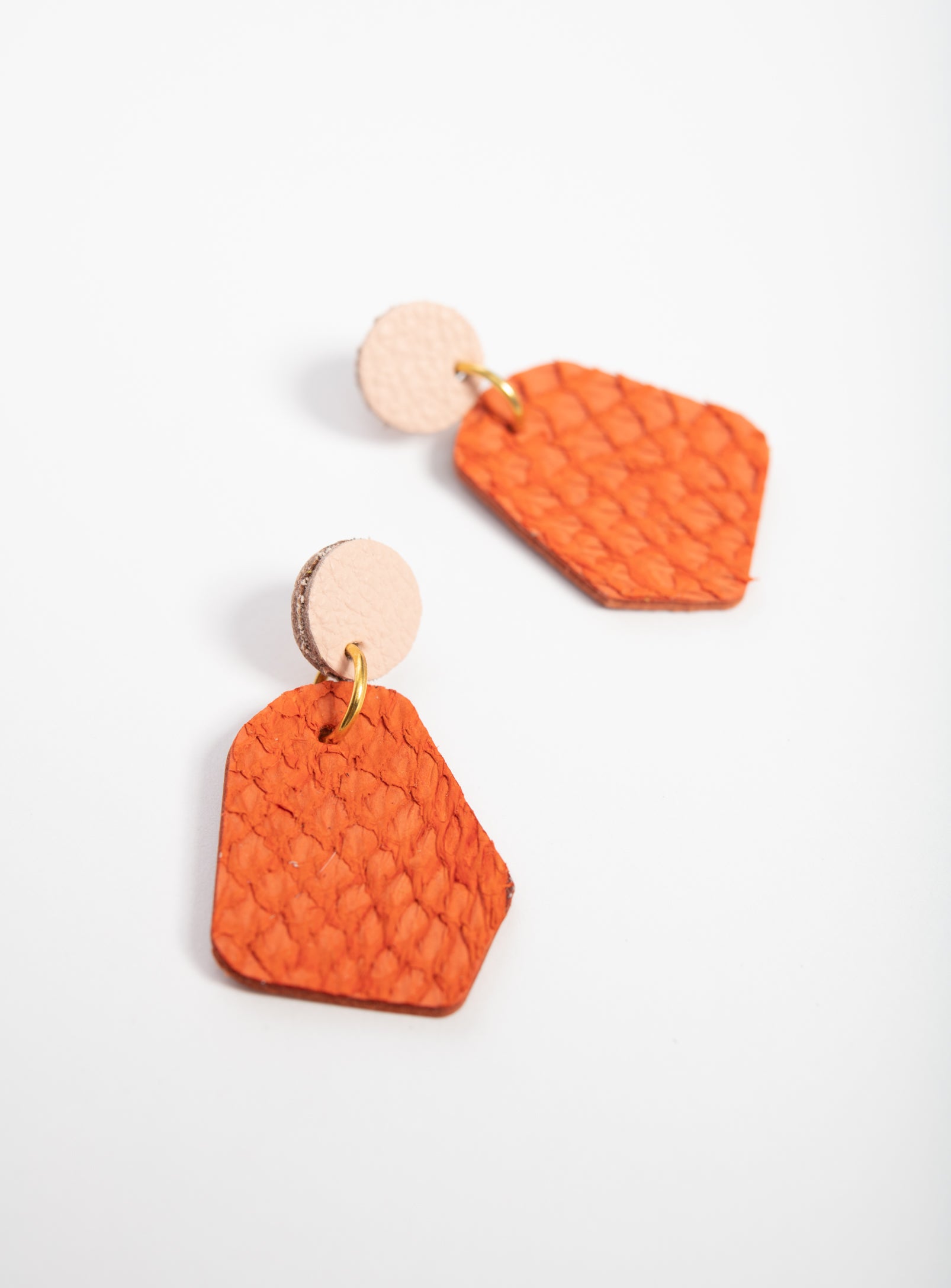 Large geometrical leather earrings DÉLIMA model, Veinage handmade in Montreal, Canada