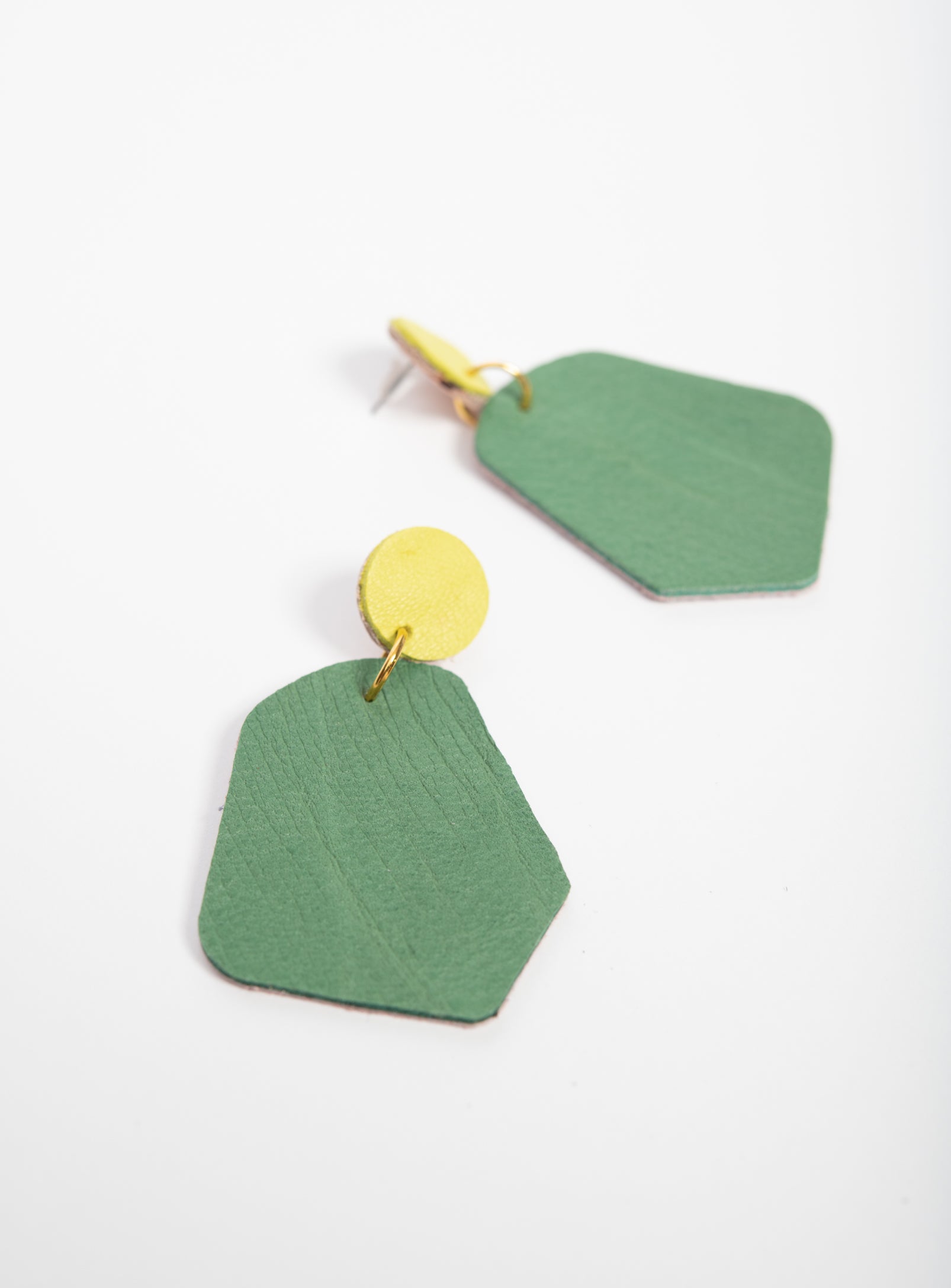 Large geometrical leather earrings DÉLIMA model, Veinage handmade in Montreal, Canada