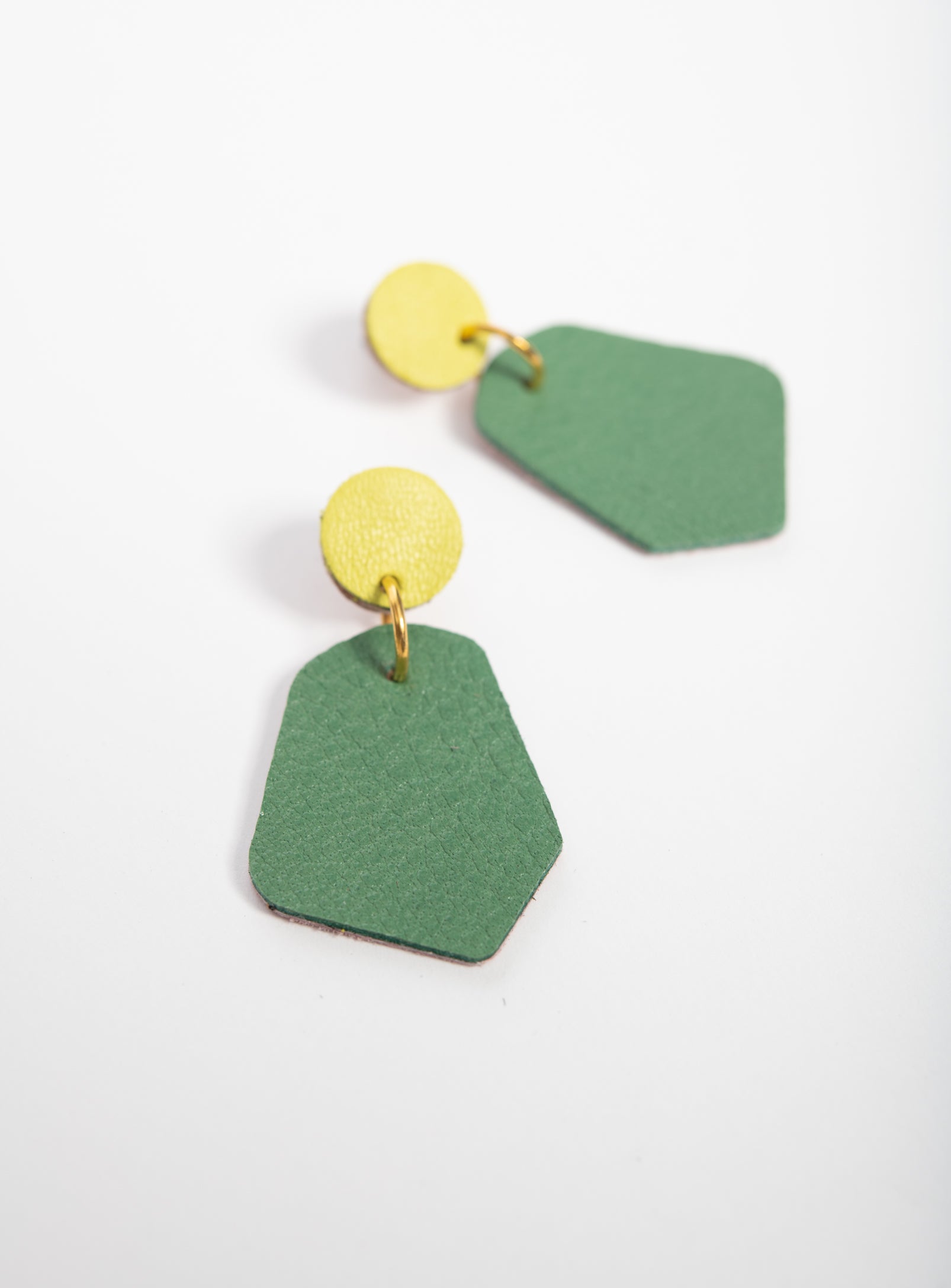 Large geometrical leather earrings DÉLIMA model, Veinage handmade in Montreal, Canada