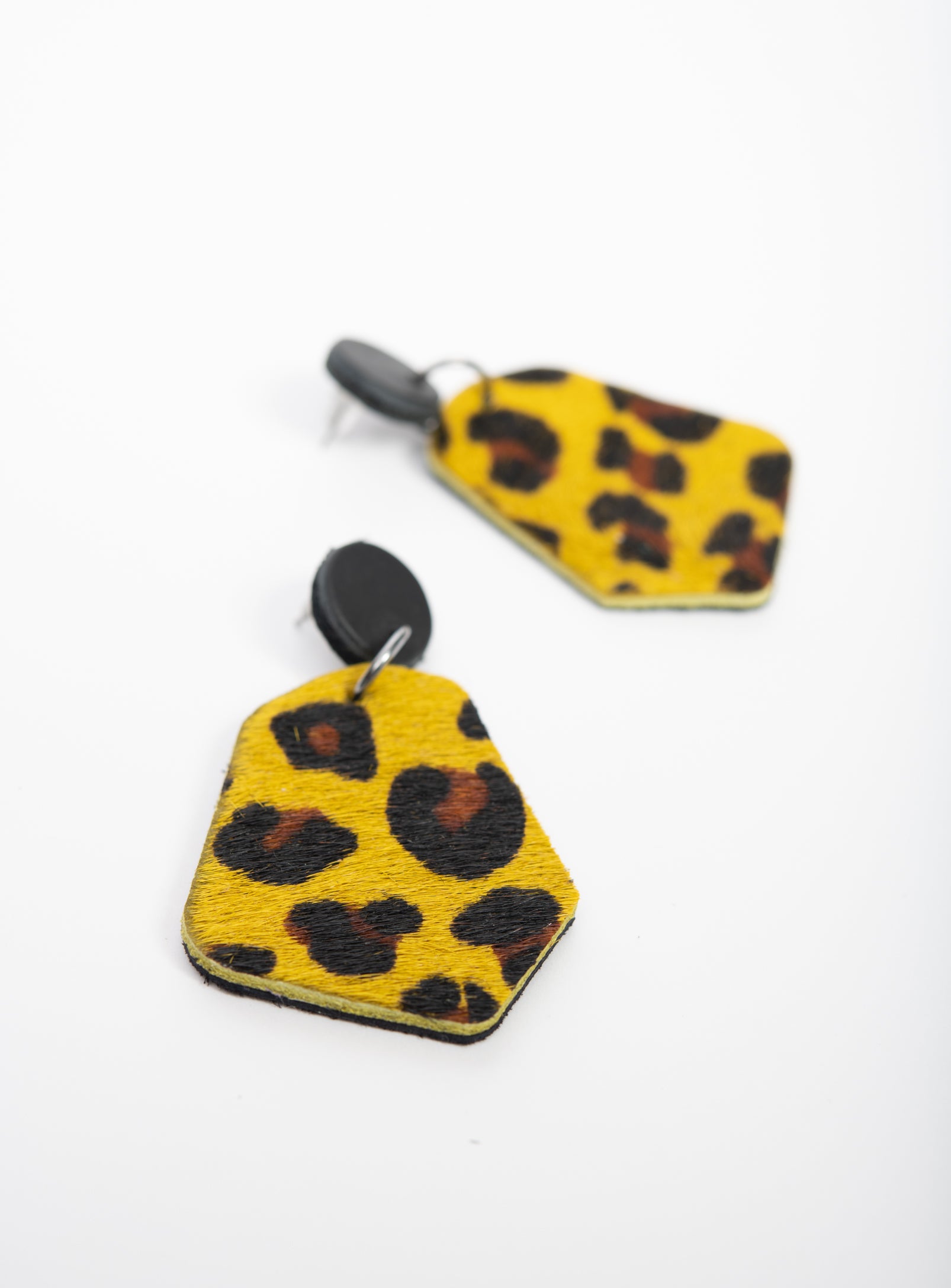 Large geometrical leather earrings DÉLIMA model, Veinage handmade in Montreal, Canada