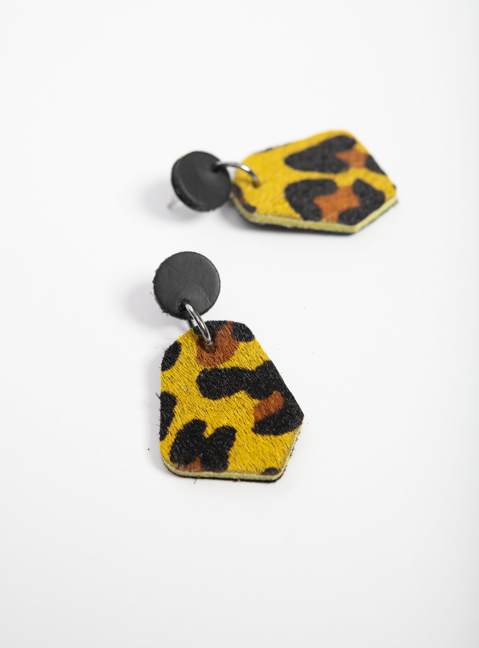 Large geometrical leather earrings DÉLIMA model, Veinage handmade in Montreal, Canada