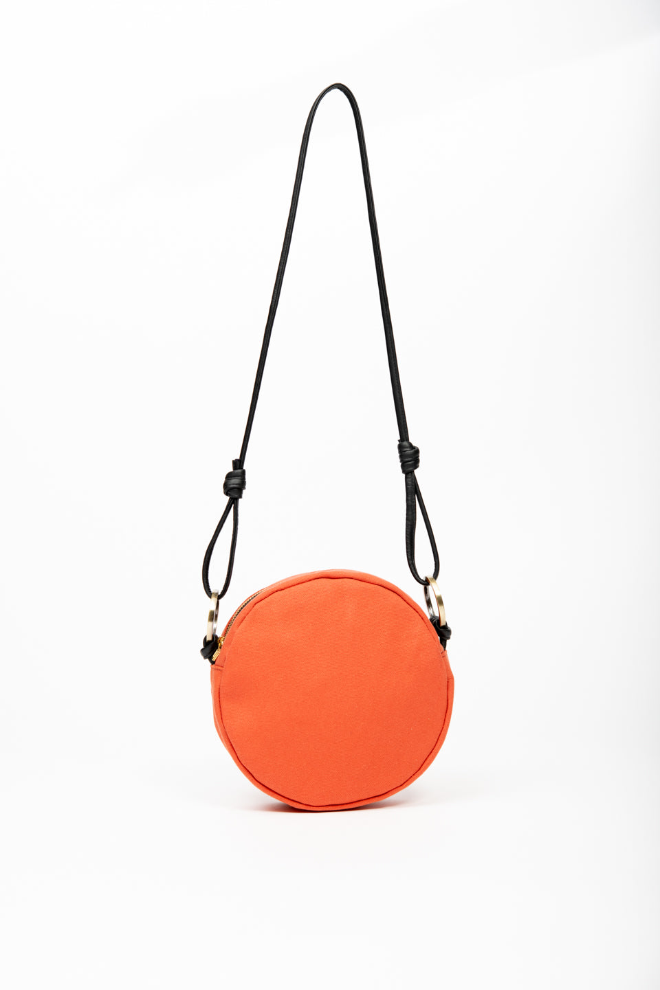 Round shoulder bag model ROTONDO of the collection Variable Geometry by VEINAGE, handmade in Montreal Canada