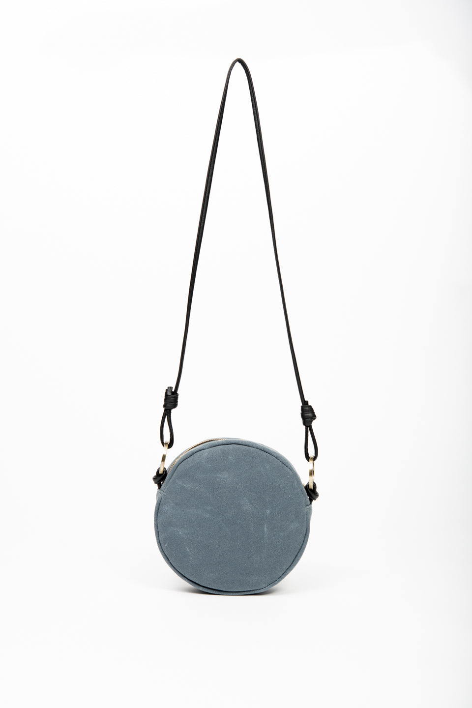 Round shoulder bag model ROTONDO of the collection Variable Geometry by VEINAGE, handmade in Montreal Canada
