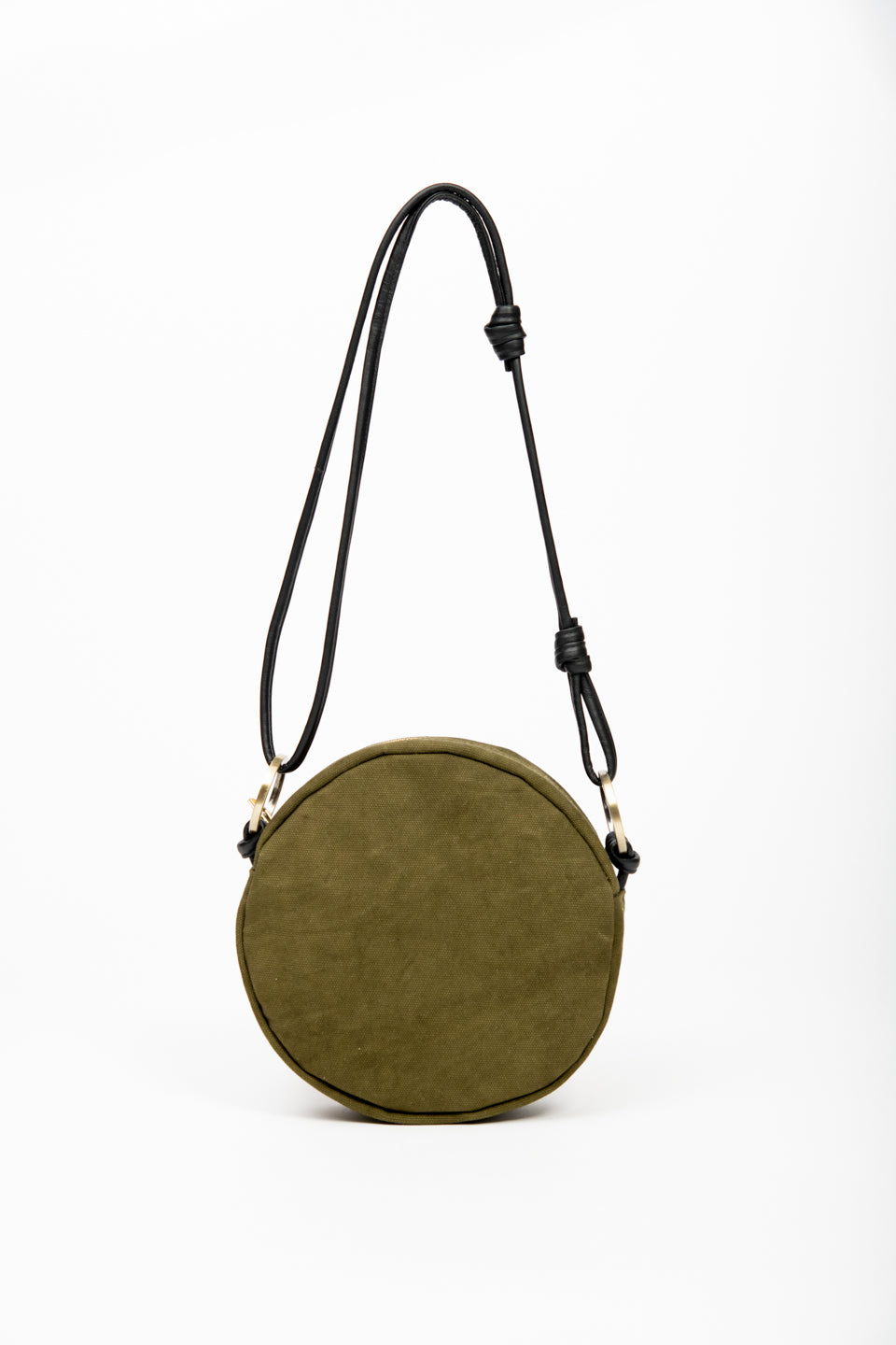Round shoulder bag model ROTONDO of the collection Variable Geometry by VEINAGE, handmade in Montreal Canada