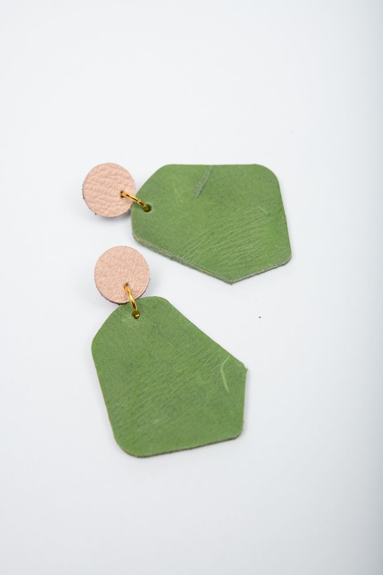 Large geometrical leather earrings DÉLIMA model, Veinage handmade in Montreal, Canada