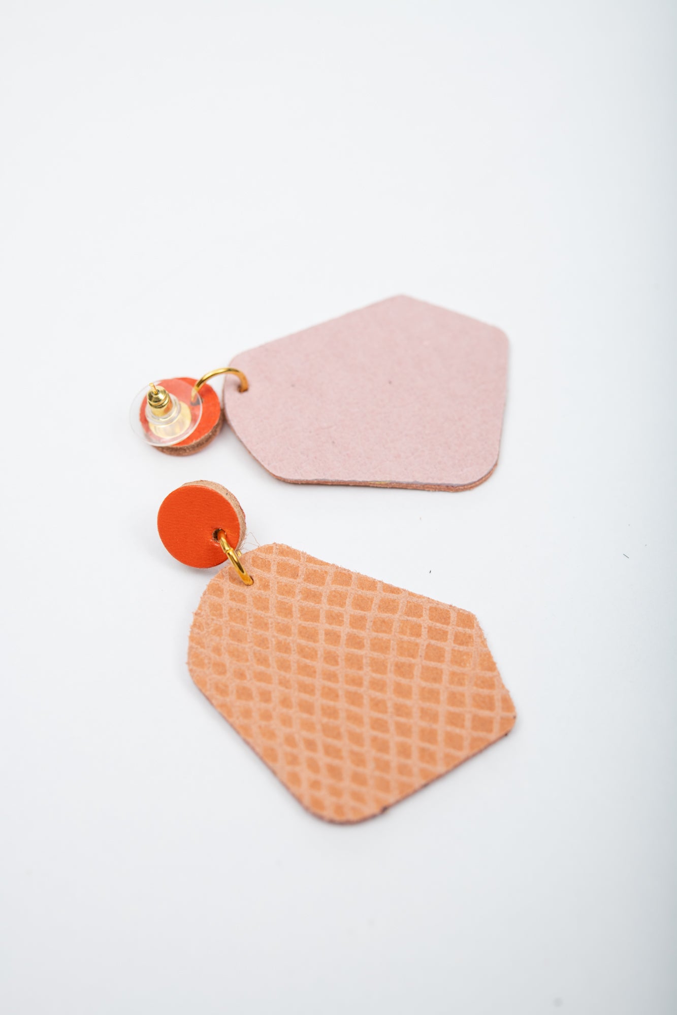 Large geometrical leather earrings DÉLIMA model, Veinage handmade in Montreal, Canada