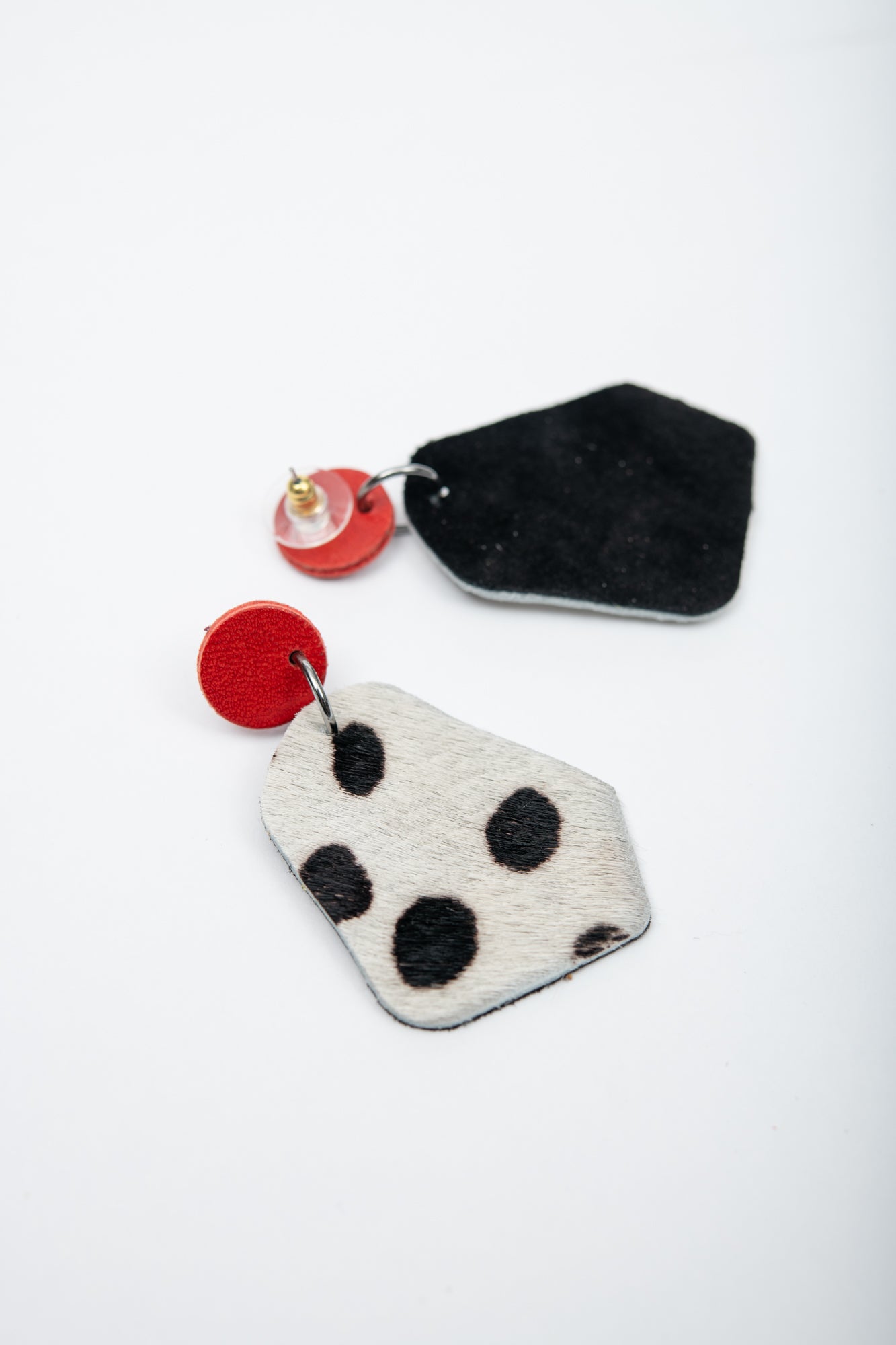 Large geometrical leather earrings DÉLIMA model, Veinage handmade in Montreal, Canada