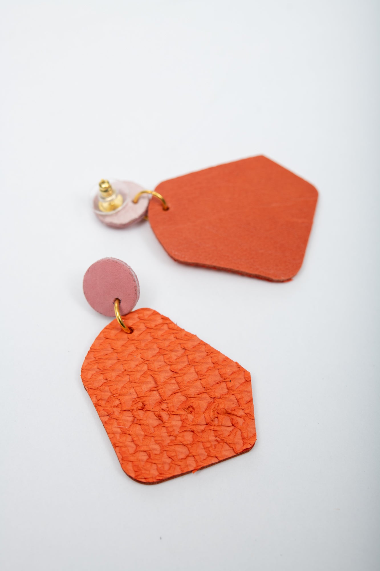 Large geometrical leather earrings DÉLIMA model, Veinage handmade in Montreal, Canada