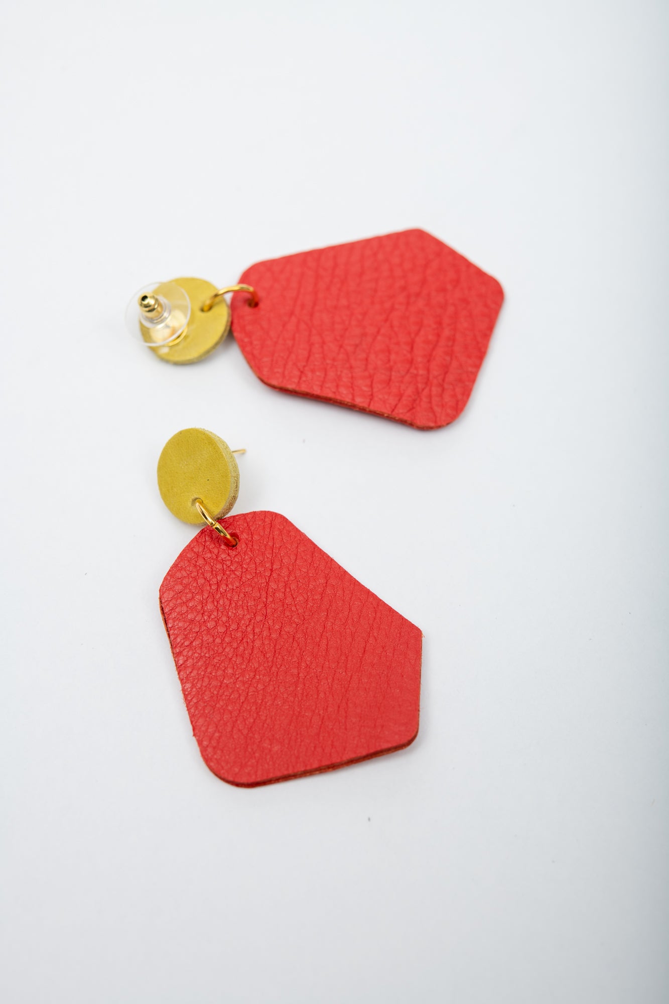 Large geometrical leather earrings DÉLIMA model, Veinage handmade in Montreal, Canada