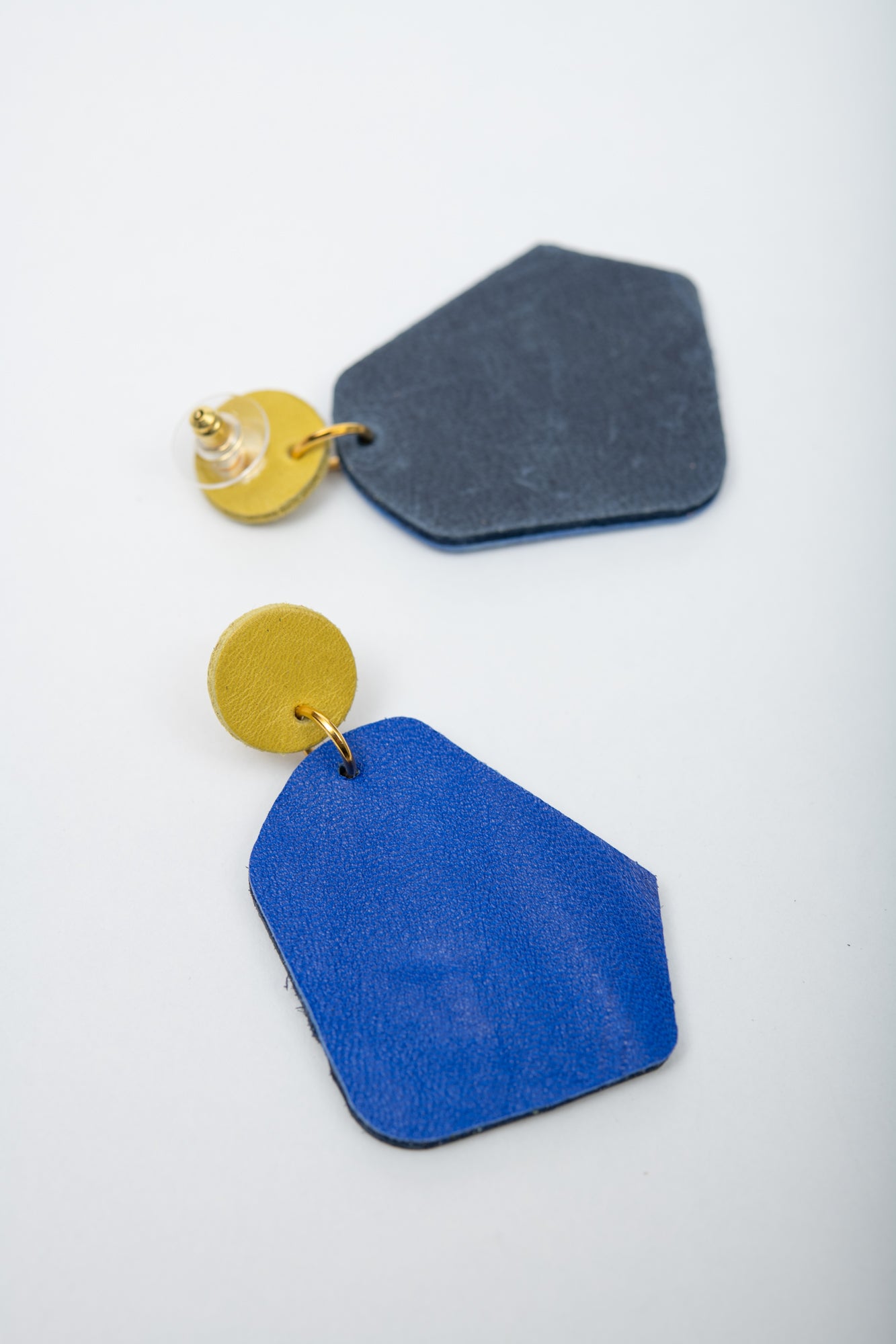 Large geometrical leather earrings DÉLIMA model, Veinage handmade in Montreal, Canada