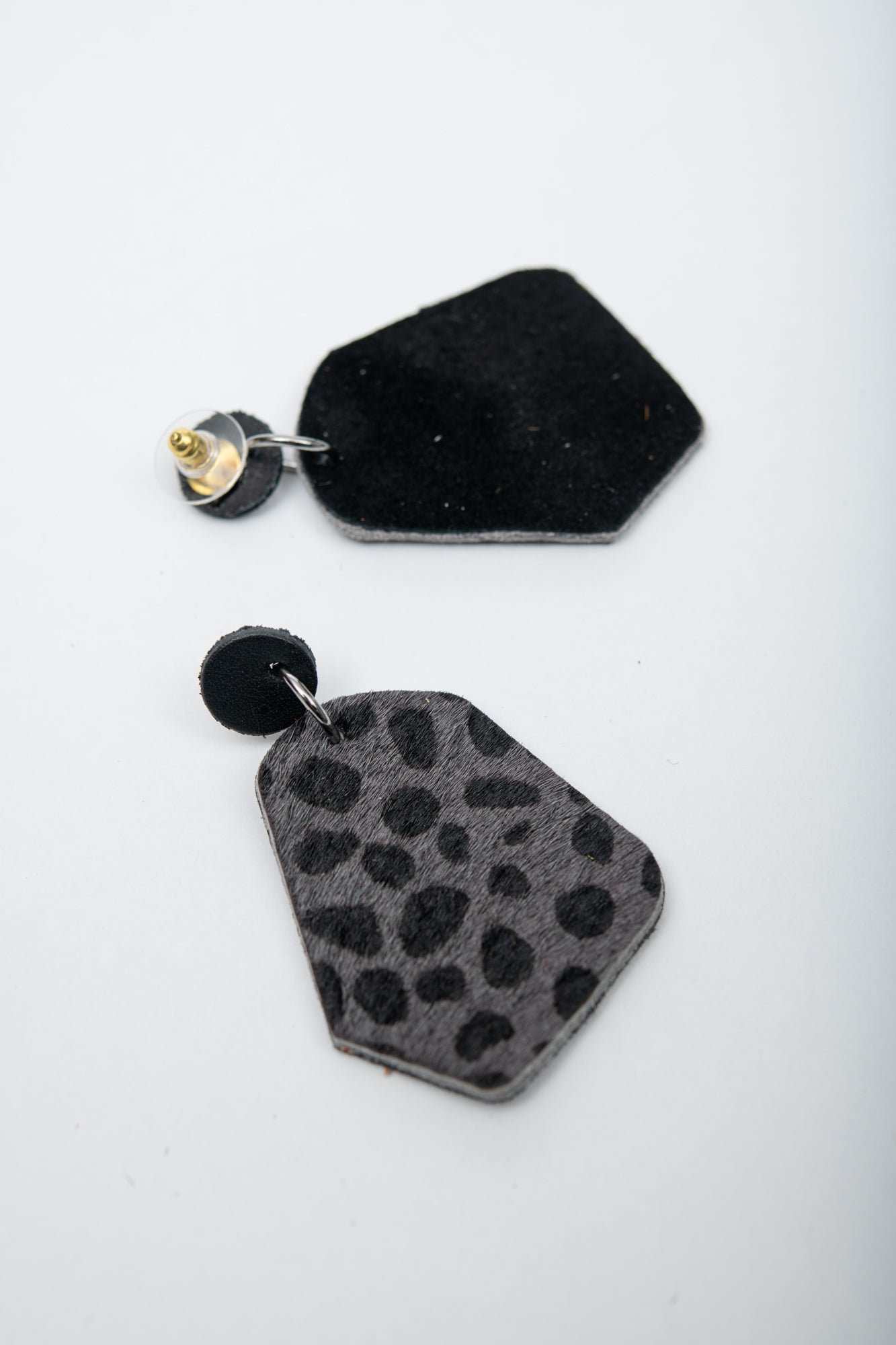 Large geometrical leather earrings DÉLIMA model, Veinage handmade in Montreal, Canada