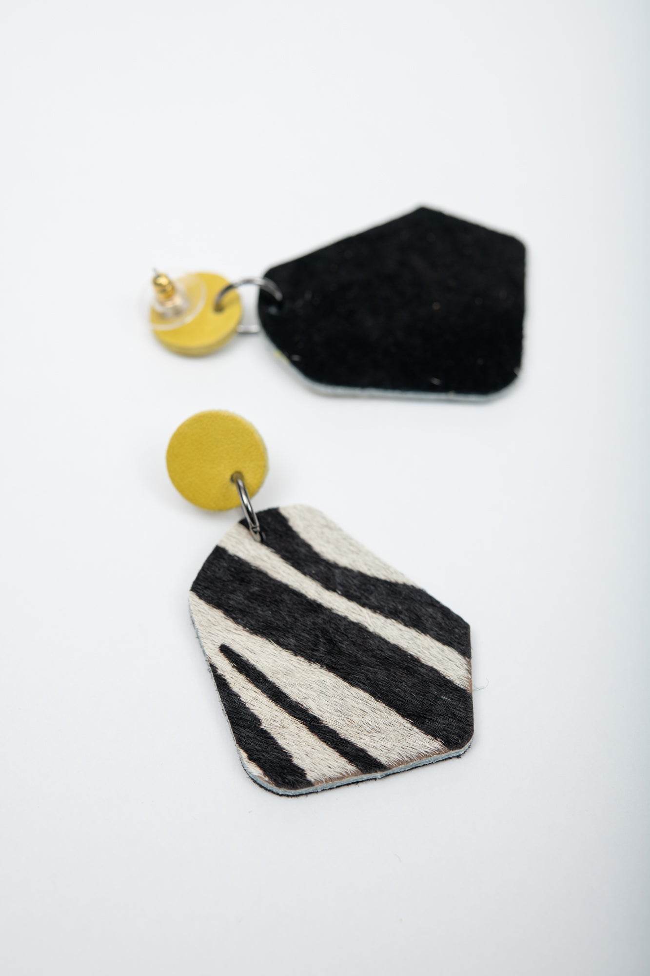 Large geometrical leather earrings DÉLIMA model, Veinage handmade in Montreal, Canada