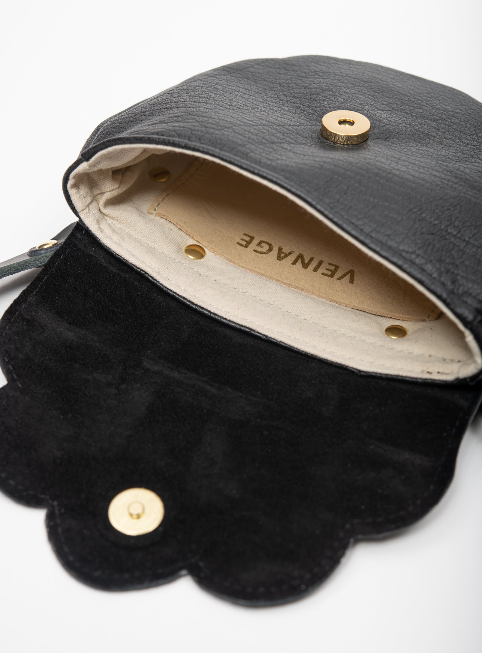 Leather bag with shoulder strap and scalloped flap PRIMULA model, all Veinage are handmade in Montreal, Canada