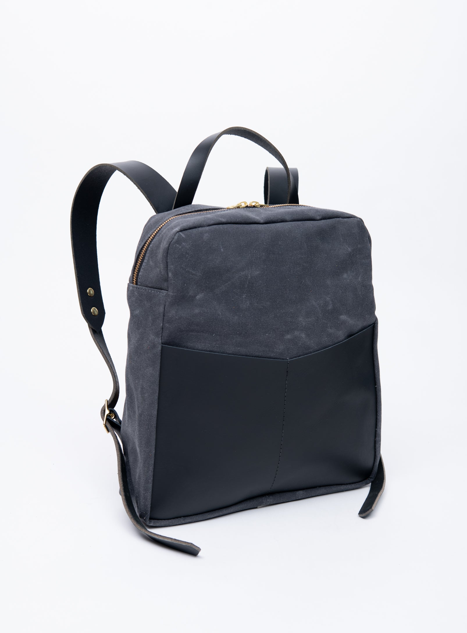 Veinage Gilford black leather and army green waxed canvas backpack, handmade in Montreal Canada